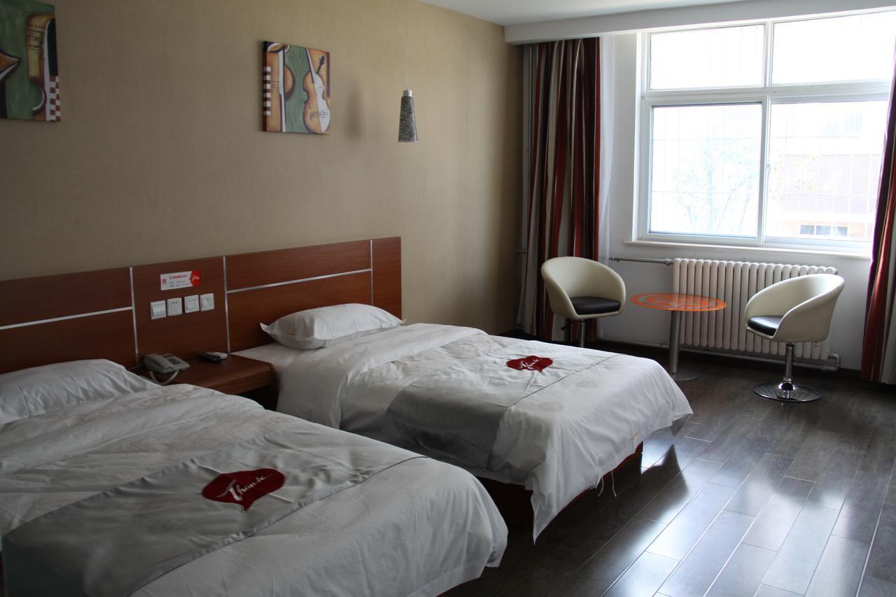 Thank Inn Chain Hotel Shandong Liaocheng Economic Development Zone Jiuhe Community Exterior photo